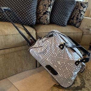 Henri Bendel rolling duffle bag